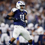 Nov 28, 2024; Arlington, Texas, USA; Dallas Cowboys linebacker Micah Parsons (11) celebrates after a sack during the third quarter against the New York Giants at AT&T Stadium. Mandatory Credit: Andrew Dieb-Imagn Images
