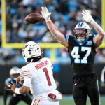 Dec 22, 2024; Charlotte, North Carolina, USA; Arizona Cardinals quarterback Kyler Murray (1) passes the ball as Carolina Panthers linebacker Josey Jewell (47) pressures in the third quarter at Bank of America Stadium. Mandatory Credit: Bob Donnan-Imagn Images
