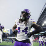 Dec 22, 2024; Seattle, Washington, USA; Minnesota Vikings safety Josh Metellus (44) poses for a photo following a Seattle Seahawks turnover during the fourth quarter at Lumen Field. Mandatory Credit: Joe Nicholson-Imagn Images