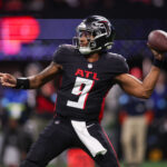 Jan 5, 2025; Atlanta, Georgia, USA; Atlanta Falcons quarterback Michael Penix Jr. (9) throws a pass against the Carolina Panthers in the third quarter at Mercedes-Benz Stadium. Mandatory Credit: Brett Davis-Imagn Images