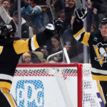 Jan 9, 2025; Pittsburgh, Pennsylvania, USA; Pittsburgh Penguins right wing Rickard Rakell (right) celebrates his goal with right wing Bryan Rust (17) against the Edmonton Oilers during the first period at PPG Paints Arena. Mandatory Credit: Charles LeClaire-Imagn Images