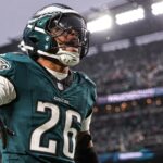 Madden NFL 26 cover Saquon Barkley - Jan 19, 2025; Philadelphia, Pennsylvania, USA; Philadelphia Eagles running back Saquon Barkley (26) reacts to his touchdown against the Los Angeles Rams in a 2025 NFC divisional round game at Lincoln Financial Field. Mandatory Credit: Bill Streicher-Imagn Images