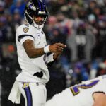 Baltimore Ravens quarterback Lamar Jackson directs his teammates before the snap during first half action at the Buffalo Bills divisional game against the Baltimore Ravens at Highmark Stadium in Orchard Park on Jan. 19, 2025.