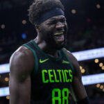 Mar 6, 2025; Boston, Massachusetts, USA; Boston Celtics center Neemias Queta (88) reacts after his basket against the Philadelphia 76ers in the second half at TD Garden.