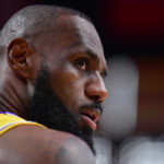 Mar 6, 2025; Los Angeles, California, USA; Los Angeles Lakers forward LeBron James (23) reacts during the first half at Crypto.com Arena.