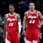 Mar 7, 2025; Dallas, Texas, USA; Memphis Grizzlies guard Ja Morant (12) and Memphis Grizzlies guard Desmond Bane (22) against the Dallas Mavericks during the second half at American Airlines Center.