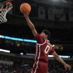 Mar 21, 2025; Raleigh, NC, USA; Oklahoma Sooners guard Jeremiah Fears (0) drives to the basket during the first half against the Oklahoma Sooners at Lenovo Center. Mandatory Credit: Bob Donnan-Imagn Images