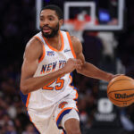 New York Knicks forward Mikal Bridges (25) dribbles up court during the first half against the Washington Wizards at Madison Square Garden.