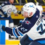 NHL Free Agency Apr 3, 2025; Las Vegas, Nevada, USA; Winnipeg Jets left wing Nikolaj Ehlers (27) warms up before a game against the Vegas Golden Knights at T-Mobile Arena. Mandatory Credit: Stephen R. Sylvanie-Imagn Images