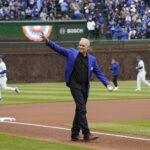 Apr 4, 2025; Chicago, Illinois, USA; Hall of Famer Ryne Sandberg throws out a ceremonial first pitch before the game between the Chicago Cubs and the San Diego Padres at Wrigley Field. Mandatory Credit: David Banks-Imagn Images