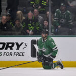 Apr 8, 2025; Dallas, Texas, USA; Dallas Stars defenseman Matt Dumba (3) looks on as the Vancouver Canucks celebrate the victory over the Stars in the overtime period at the American Airlines Center. Mandatory Credit: Jerome Miron-Imagn Images