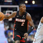 Mar 31, 2025; Washington, District of Columbia, USA; Miami Heat guard Terry Rozier (2) drives to the basket against Washington Wizards guard AJ Johnson (5) during the first quarter at Capital One Arena.