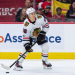 Apr 15, 2025; Ottawa, Ontario, CAN; Chicago Blackhawks center Connor Bedard (98) controls the puck in the second period against the Ottawa Senators at the Canadian Tire Centre. Mandatory Credit: Marc DesRosiers-Imagn Images