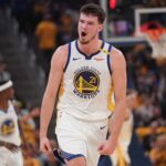 Quinten Post Warriors Apr 15, 2025; San Francisco, California, USA; Golden State Warriors center Quinten Post (21) reacts after making a three point basket against the Memphis Grizzlies in the second quarter at the Chase Center. Mandatory Credit: Cary Edmondson-Imagn Images