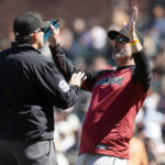 May 14, 2025; San Francisco, California, USA; Arizona Diamondbacks manager Torey Lovullo (right) argues an interference call with umpire Mark Ripperger during the eighth inning against the San Francisco Giants at Oracle Park. Mandatory Credit: D. Ross Cameron-Imagn Images