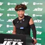 Jun 11, 2025; Florham Park, NY, USA; New York Jets quarterback Justin Fields (7) speaks at a press conference during minicamp at Atlantic Health Jets Training Center. Mandatory Credit: John Jones-Imagn Images
