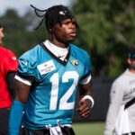 Jacksonville Jaguars wide receiver Travis Hunter (12) jogs to his first drill during the Jacksonville Jaguars’ third mandatory minicamp Thursday June 12, 2025 at the Miller Electric Center in Jacksonville, Fla. [Doug Engle/Florida Times-Union] Travis Hunter