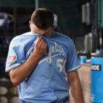 Jun 18, 2025; Arlington, Texas, USA; Kansas City Royals pitcher Kris Bubic (50) in the dugout after being taken out of the game during the sixth inning against the Texas Rangers at Globe Life Field.