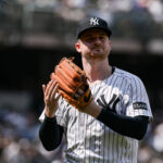 Jun 21, 2025; Bronx, New York, USA; New York Yankees pitcher Clarke Schmidt (36) reacts after leaving the game during the seventh inning against the Baltimore Orioles at Yankee Stadium. Mandatory Credit: John Jones-Imagn Images