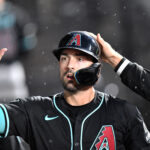 Jun 24, 2025; Chicago, Illinois, USA; Arizona Diamondbacks designated hitter Randal Grichuk (15) celebrates with teammates in the dugout after scoring during the seventh inning against the Chicago White Sox at Rate Field. Mandatory Credit: Patrick Gorski-Imagn Images