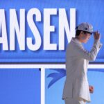Jun 25, 2025; Brooklyn, NY, USA; Yang Hansen looks on after being selected as the 16th pick by the Memphis Grizzlies in the first round of the 2025 NBA Draft at Barclays Center. Mandatory Credit: Brad Penner-Imagn Images
