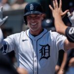 Detroit Tigers Kerry Carpenter smiles as he celebrates after hitting a home run against the Twins at Comerica Park in Detroit on Saturday, June 28, 2025.