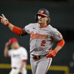 Jun 30, 2025; Arlington, Texas, USA; Baltimore Orioles shortstop Gunnar Henderson (2) rounds the bases after he hits a two run home run against the Texas Rangers during the tenth inning at Globe Life Field. Mandatory Credit: Jerome Miron-Imagn Images