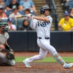 Jul 2, 2025; Tampa, Florida, USA; Tampa Bay Rays second baseman Brandon Lowe (8) doubles against the Oakland Athletics in the sixth inning at George M. Steinbrenner Field. Mandatory Credit: Nathan Ray Seebeck-Imagn Images