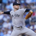 Jul 3, 2025; Toronto, Ontario, CAN; New York Yankees starting pitcher Clarke Schmidt (36) pitches to the Toronto Blue Jays during the second inning at Rogers Centre. Mandatory Credit: John E. Sokolowski-Imagn Images