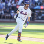 Jul 4, 2025; New York City, New York, USA; New York Mets second baseman Jeff McNeil (1) reacts after hitting a two run home run in the seventh inning against the New York Yankees at Citi Field. Mandatory Credit: Wendell Cruz-Imagn Images