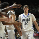 Jul 10, 2025; Las Vegas, NV, USA; NBA Summer League; Dallas Mavericks forward Cooper Flagg (32) subs out against the Los Angeles Lakers in the second quarter of their game at Thomas & Mack Center.