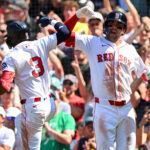 Jul 13, 2025; Boston, Massachusetts, USA; Boston Red Sox outfielder Ceddanne Rafaela (3) celebrates with third base Marcelo Mayer (39) after hitting a two-run home run against the Tampa Bay Rays during the sixth inning at Fenway Park. Mandatory Credit: Brian Fluharty-Imagn Images