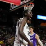 Jul 14, 2025; Las Vegas, NV, USA; San Antonio Spurs forward David Jones-Garcia (25) reacts after scoring against the Utah Jazz during overtime in a NBA Summer League basketball game at the Thomas & Mack Center.