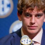 July 15, 2025; Atlanta, GA, USA; Texas quarterback Arch Manning listens to a question during SEC Media Days at the College Football Hall of Fame in Atlanta.