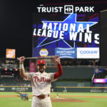 Jul 15, 2025; Cumberland, Georgia, USA; National League designated hitter Kyle Schwarber (12) of the Philadelphia Phillies celebrates after defeating the American League in the 2025 MLB All Star Game at Truist Park. Mandatory Credit: Brett Davis-Imagn Images