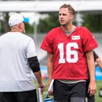 Detroit Lions quarterback Jared Goff talks to offensive coordinator John Morton after practice during training camp at Meijer Performance Center in Allen Park on Sunday, July 20, 2025.