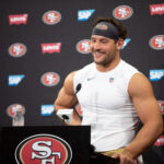 Jul 23, 2025; Santa Clara, CA, USA; San Francisco 49ers defensive end Nick Bosa answers questions from reporters following the first day of training camp at SAP Performance Facility. Mandatory Credit: D. Ross Cameron-Imagn Images