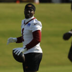 Jul 24, 2025; Ashburn, VA, USA; Washington Commanders wide receiver Deebo Samuel Sr. (1) stands on the field during warmup prior to practice on day two of training camp at OrthoVirginia Training Center at Commanders Park. Mandatory Credit: Geoff Burke-Imagn Images