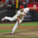 Jul 24, 2025; St. Louis, Missouri, USA; St. Louis Cardinals relief pitcher Ryan Helsley (56) pitches against the San Diego Padres during the ninth inning at Busch Stadium.