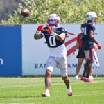 Jul 28, 2025; Foxborough, MA, USA; New England Patriots cornerback Christian Gonzalez (0) does a drill during training camp at Gillette Stadium. Mandatory Credit: Eric Canha-Imagn Images