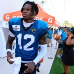 Travis Hunter Jacksonville Jaguars wide receiver Travis Hunter (12) walks to the locker room after an NFL training camp session at the Miller Electric Center, Tuesday, July 29, 2025, in Jacksonville, Fla. [Corey Perrine/Florida Times-Union]