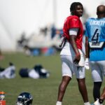Tennessee Titans quarterback Cam Ward (1) and wide receiver Tyler Lockett (4) work after practice during training camp at Ascension Saint Thomas Sports Park in Nashville, Tenn., Wednesday, July 30, 2025.