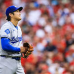 Jul 30, 2025; Cincinnati, Ohio, USA; Los Angeles Dodgers starting pitcher Shohei Ohtani (17) walks off the field at the end of the second inning against the Cincinnati Reds at Great American Ball Park. Mandatory Credit: Katie Stratman-Imagn Images