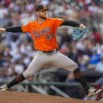 Jul 5, 2025; Cumberland, Georgia, USA; Baltimore Orioles relief pitcher Bryan Baker (43) pitches against the Atlanta Braves during the eighth inning at Truist Park.