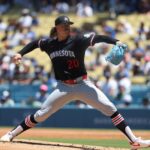 Jul 23, 2025; Los Angeles, California, USA; Minnesota Twins starting pitcher Chris Paddack (20) throws during the second inning against the Los Angeles Dodgers at Dodger Stadium.