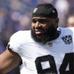 Sep 15, 2024; Baltimore, Maryland, USA; Las Vegas Raiders defensive tackle Christian Wilkins (94) before the game against the Baltimore Ravens at M&T Bank Stadium.