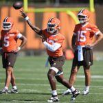 Jul 23, 2025; Berea, OH, USA; Cleveland Browns quarterback Dillon Gabriel (5) throws a pass as quarterback Joe Flacco (15) land quarterback Dillon Gabriel (5) look on during training camp at CrossCountry Mortgage Campus.