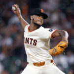 Jul 28, 2025; San Francisco, California, USA; San Francisco Giants pitcher Camilo Doval (75) delivers a pitch against the Pittsburgh Pirates during the ninth inning at Oracle Park.
