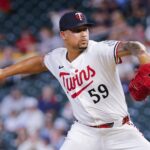 Jul 28, 2025; Minneapolis, Minnesota, USA; Minnesota Twins relief pitcher Jhoan Duran (59) throws to the Boston Red Sox in the ninth inning at Target Field.
