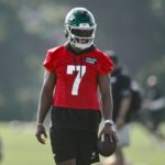 Jul 25, 2025; Florham Park, NJ, USA; New York Jets quarterback Justin Fields (7) looks on during a drill at training camp at Atlantic Health Jets Training Center.